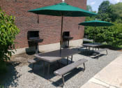 Thumbnail 13 of 20 - Spacious Grill Area at Coach House