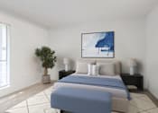 Thumbnail 8 of 18 - A bedroom with a large bed and a painting on the wall. at Grove at St. Andrews, Columbia, SC, 29210