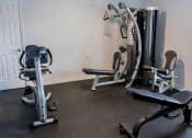 Thumbnail 10 of 13 - a gym with cardio equipment in a home gym at Retreat at Savannah, Savannah, 31404