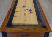 Thumbnail 8 of 13 - a shuffleboard table in a living room with a tv at Retreat at Savannah, Savannah, 31404