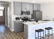 Thumbnail 2 of 21 - A kitchen with a white island and black stools.