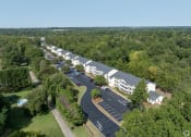 Thumbnail 3 of 19 - an aerial view of a hotel and parking lot