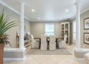 Thumbnail 13 of 17 - a formal dining room with a large table and chairs
