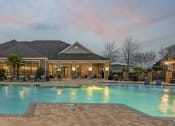 Thumbnail 21 of 49 - a swimming pool with chairs and a house with a pool at Century HomePlace, Alabama, 36066