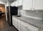 Thumbnail 7 of 10 - 55 Pharr Apartment Kitchen
