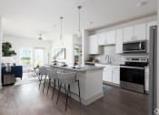 Thumbnail 9 of 27 - Kitchen and living roomat Century Vista Palms, Florida