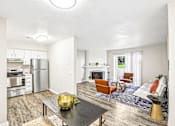 Thumbnail 5 of 26 - A modern kitchen with a dining table and chairs.