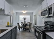 Thumbnail 9 of 19 - Model Dining Area at SoCO Apartments at Vinings, Georgia