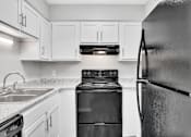 Thumbnail 9 of 23 - Renovated Kitchen at Summit Eastchester, North Carolina