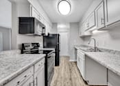 Thumbnail 1 of 19 - Renovated Kitchen