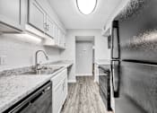 Thumbnail 2 of 19 - Renovated Kitchen