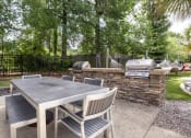 Thumbnail 7 of 26 - Outdoor grill station at Oasis at Cedar Branch in Wilmington, NC