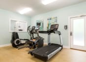 Thumbnail 13 of 31 - Cardio equipment in fitness center at Oasis at Twinwood in Wilmington, NC