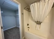 Thumbnail 24 of 26 - Bathroom with connecting closet at Oasis at Cedar Branch in Wilmington, NC