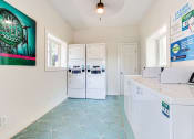 Thumbnail 27 of 34 - a laundry room with a washer and dryer  at The Oasis on Cascade, Atlanta, 30310