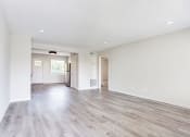 Thumbnail 17 of 34 - an empty living room with a hardwood floor  at The Oasis on Cascade, Atlanta, GA
