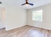 Thumbnail 19 of 34 - an empty room with a ceiling fan and a window  at The Oasis on Cascade, Atlanta, 30310