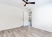 Thumbnail 20 of 34 - a bedroom with white walls and a ceiling fan  at The Oasis on Cascade, Atlanta, GA, 30310