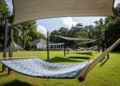 Thumbnail 19 of 30 - Relaxing hammocks  at Avenues at Holcomb Bridge, Peachtree Corners, 30092
