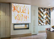 Thumbnail 13 of 22 - a painting hangs above a fireplace in a living room