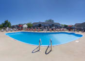 Thumbnail 24 of 53 - our resort style pool is open to the community and has lounge chairs around it at The Dylan, Murfreesboro