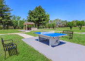 Thumbnail 33 of 53 - a ping pong table in a park with a gazebo at The Dylan, Murfreesboro, TN