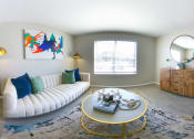 Thumbnail 7 of 53 - a living room with a white couch and a coffee table at The Dylan, Tennessee, 37129