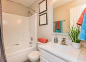 Thumbnail 12 of 53 - a bathroom with a sink toilet and a bath tub at The Dylan, Murfreesboro, TN 
