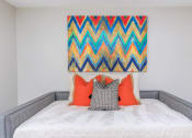 Thumbnail 16 of 53 - a bedroom with a bed and a painting on the wall at The Dylan, Tennessee, 37129