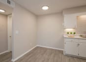 Thumbnail 46 of 53 - a kitchen with white cabinets and a white counter top at The Dylan, Tennessee, 37129