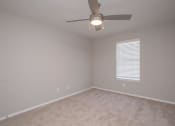 Thumbnail 51 of 53 - a bedroom with a ceiling fan and a window at The Dylan, Tennessee, 37129