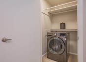 Thumbnail 13 of 53 - a laundry room with a washer and dryer in it at The Dylan, Murfreesboro, TN
