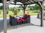 Thumbnail 32 of 53 - a patio with a table and chairs on a porch at The Dylan, Tennessee, 37129