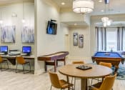 Thumbnail 16 of 49 - a game room with a pool table and a tv at Century HomePlace, Prattville