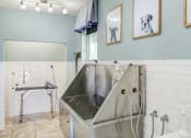 Thumbnail 30 of 49 - a large stainless steel sink in a bathroom with a shower at Century HomePlace, Prattville Alabama