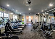 Thumbnail 5 of 38 - A gym with treadmills, exercise bikes, and other equipment.at Century Ariva, Lakeland Florida  