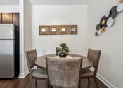 Thumbnail 7 of 48 - A dining room with a table and chairs.at Century Hampton Roads, Suffolk, 23435  