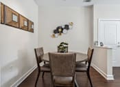 Thumbnail 8 of 48 - A dining room with a table and chairs.at Century Hampton Roads, Virginia, 23435