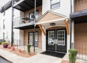 Thumbnail 6 of 35 - Apartment entrance with patio and balcony at Parkside Sandy Springs Atlanta, GA