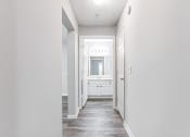 Thumbnail 24 of 35 - Hallway with wood like flooring at Parkside at Sandy Springs Atlanta, GA