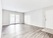 Thumbnail 21 of 35 - Classic living space with sliding glass door at Parkside at Sandy Springs Atlanta, GA