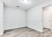 Thumbnail 22 of 35 - Dinning room with wood-like flooring at Parkside at Sandy Springs Atlanta, GA