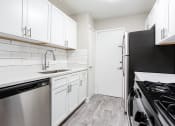 Thumbnail 14 of 35 - Modern kitchen and sink at Parkside at Sandy Springs Atlanta, GA