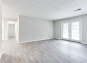Thumbnail 28 of 35 - Open living and dinning room at Parkside at Sandy Springs Atlanta, GA