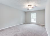 Thumbnail 31 of 35 - Ceiling fan and plush carpet at Parkside at Sandy Springs Atlanta, GA