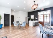 Thumbnail 9 of 35 - Spacious Clubhouse featuring seating areas and hardwood flooring at Parkside at Sandy Springs
