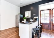 Thumbnail 10 of 35 - Kitchen with bar stools at Parkside at Sandy Springs