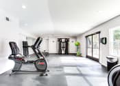 Thumbnail 4 of 35 - Spacious fitness center with large windows at Parkside at Sandy Springs Atlanta, GA