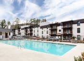 Thumbnail 2 of 35 - Spacious pool and sundeck