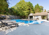 Thumbnail 23 of 49 - the pool is next to a house with a resort style pool  at Peaks at Gainesville, Gainesville, 30507
